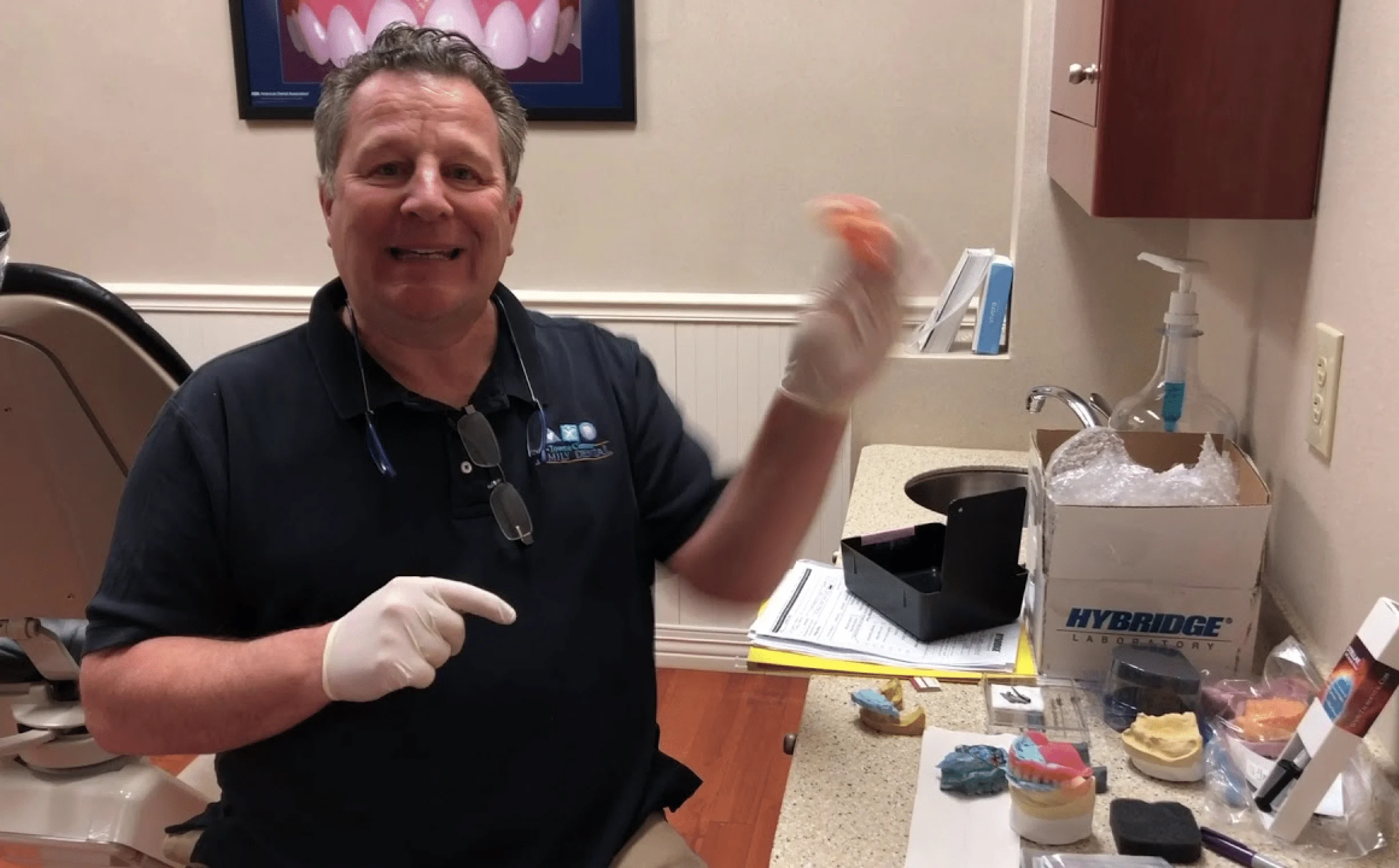 Dr. Al Internoscia video on digital dentures, patient giving a thumbs-up in the chair